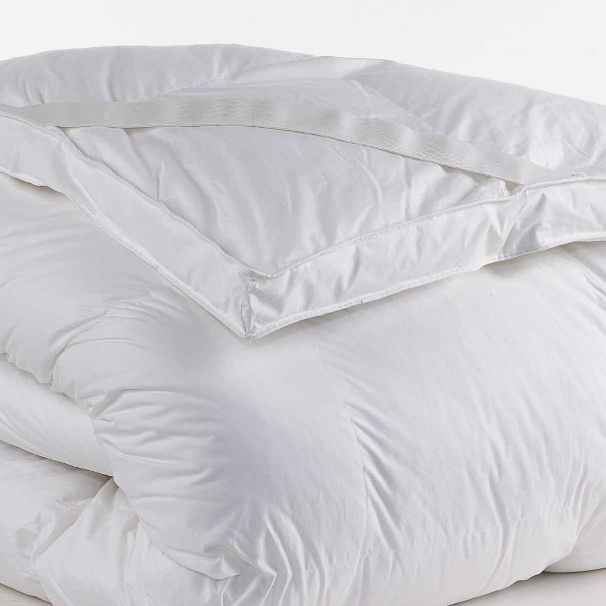 Vista ravvicinata che evidenzia la morbidezza e l'effetto soffice del topper con imbottitura in microsfere Fiberball