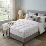 Topper matrimoniale Ruocco Home 170x190 cm ad alto spessore posizionato su un letto moderno
