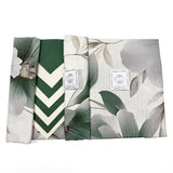 Servizio da tavola coordinato Aura Botticelli Home in cotone verde con tovaglioli rifiniti.